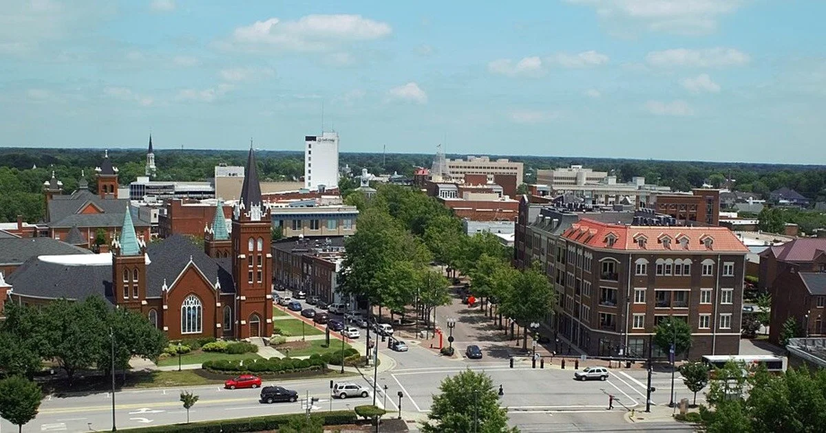 Aerial view of downtown Fayetteville, North Carolina, with churches, offices and Hay Street